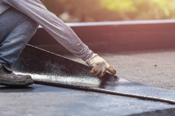 Professional Emergency Waterproofing technician working in Gladstone, MI